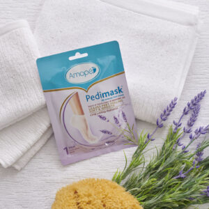 Image of amope pedimask 20 minute foot mask with lavender oil package on white towel