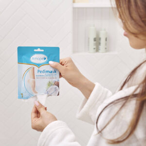 Image of amope pedimask 20 minute foot sheet mask out of package