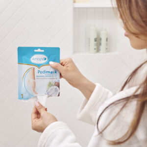 Image of amope pedimask 20 minute foot sheet mask out of package