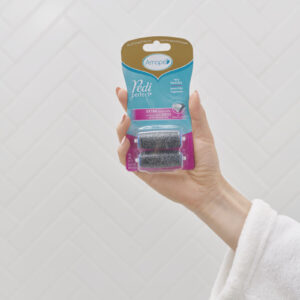 Amope pedi perfect for very hard skin with extra coarse replacement refill roller heads package held in hand